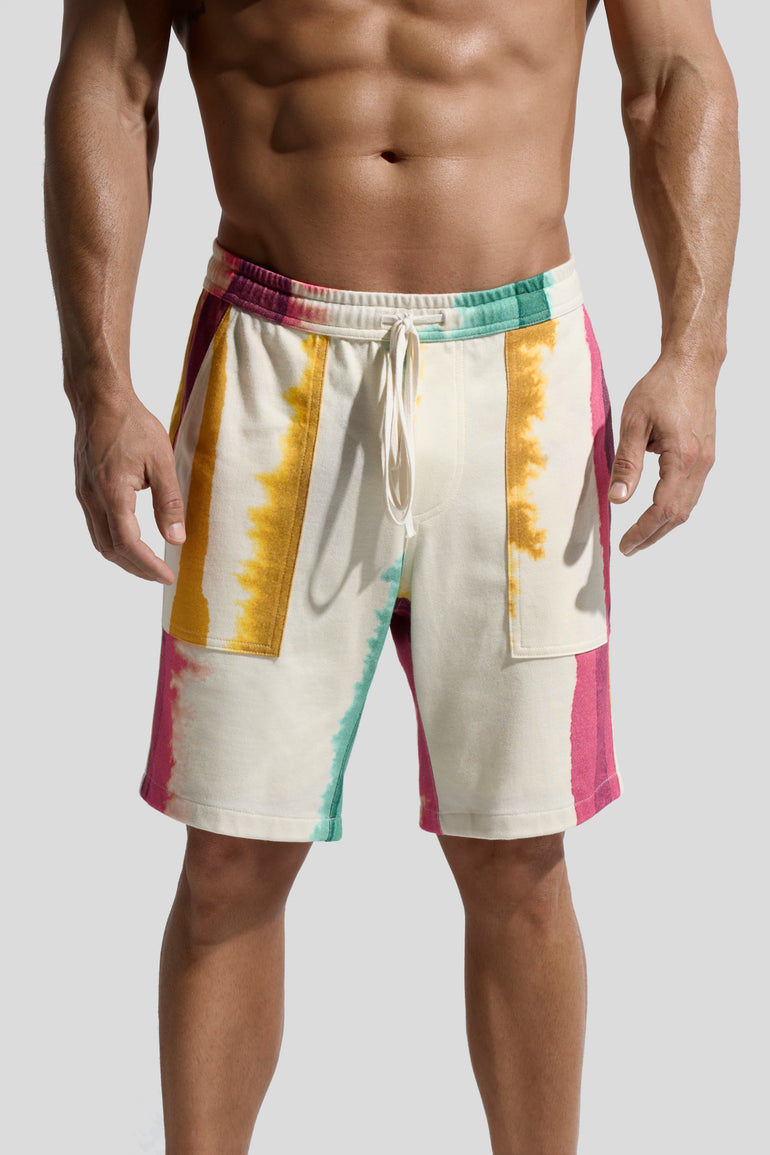 Picture of organic cotton shorts named Deia with Eivissa Print on male model by Bas Bains