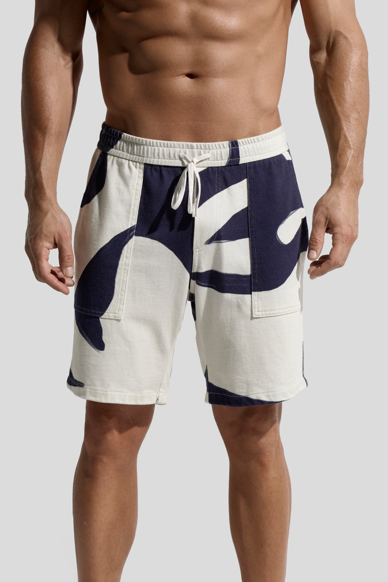 image of organic cotton shorts in Rivage print front view on male model by bas bains