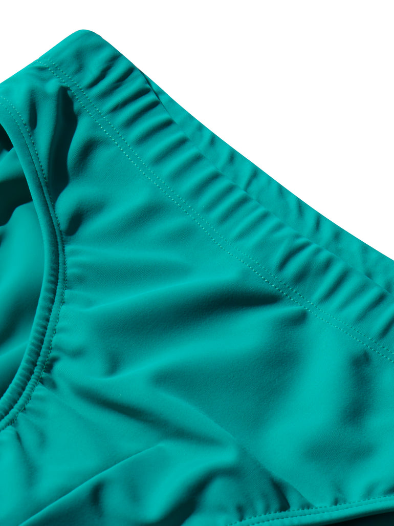 image of swimwear slip in menta green detail view by Bas Bains