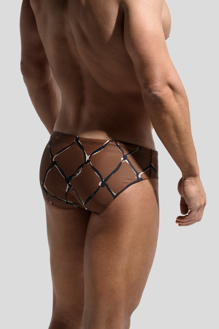 image of swimwear slip in Pescador print back view on male model by Bas Bains