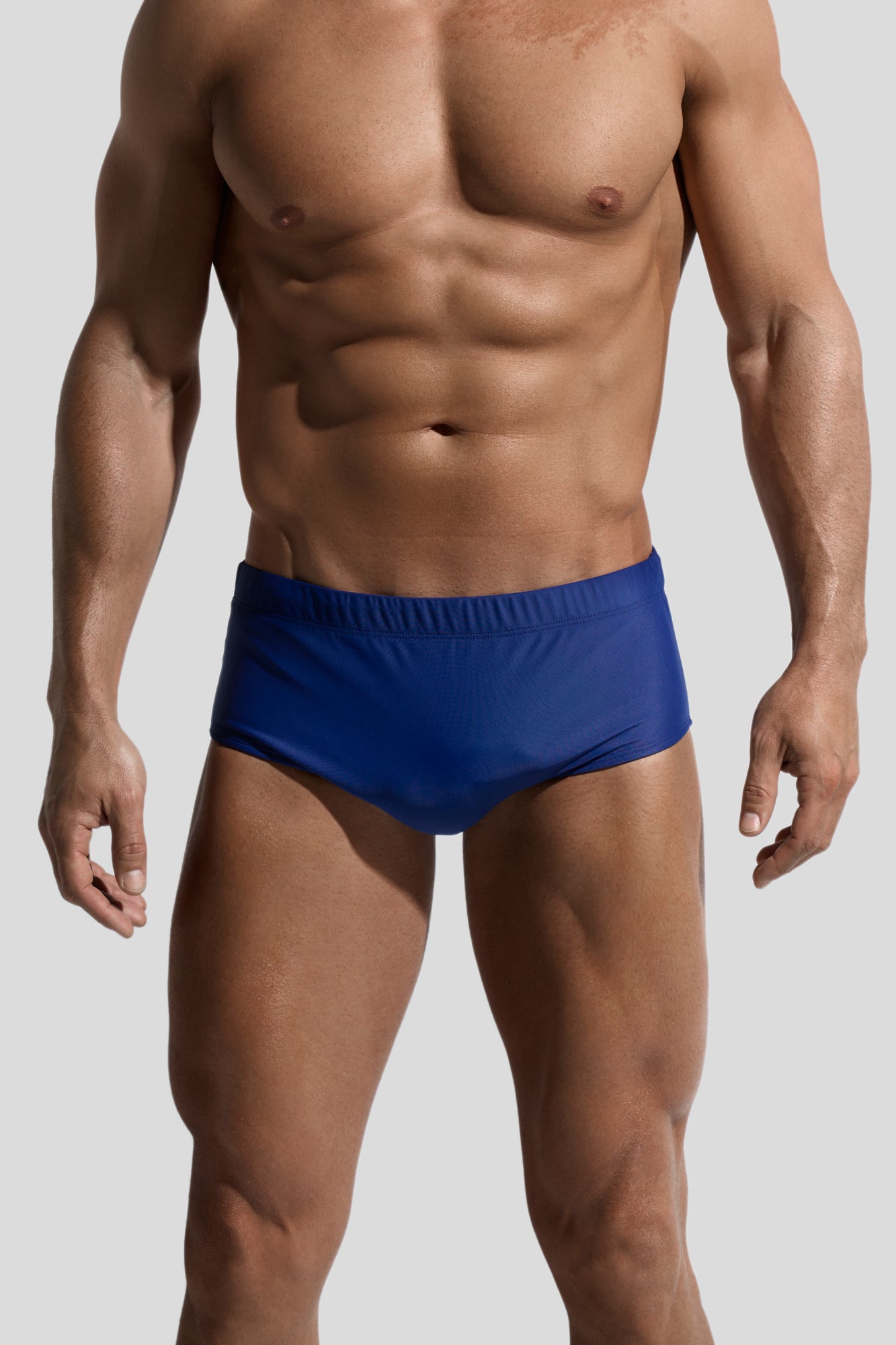 image of swimwear sunga in Marino blue front view on male model by Bas Bains