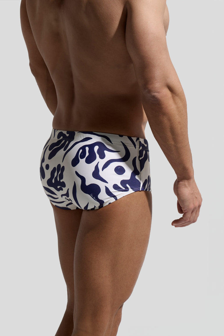 image of swimwear sunga in Rivage print back view on male model by Bas Bains