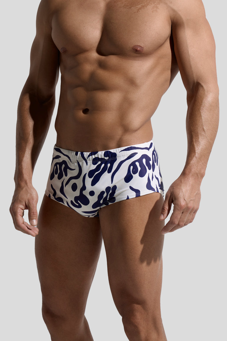 image of swimwear sunga in Rivage print side view on male model by Bas Bains