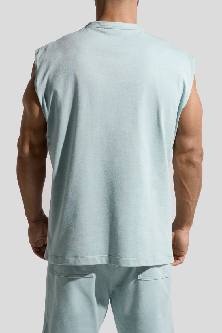 image of organic cotton tank top in Menta green back view on male model by Bas Bains